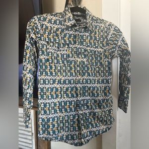 Boys size large, long sleeve, snap front, shirt. Wrangler 20x.